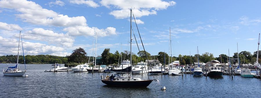 Sailboats on the Frank Hall Boat Yard mooring field on the Pawcatuck River