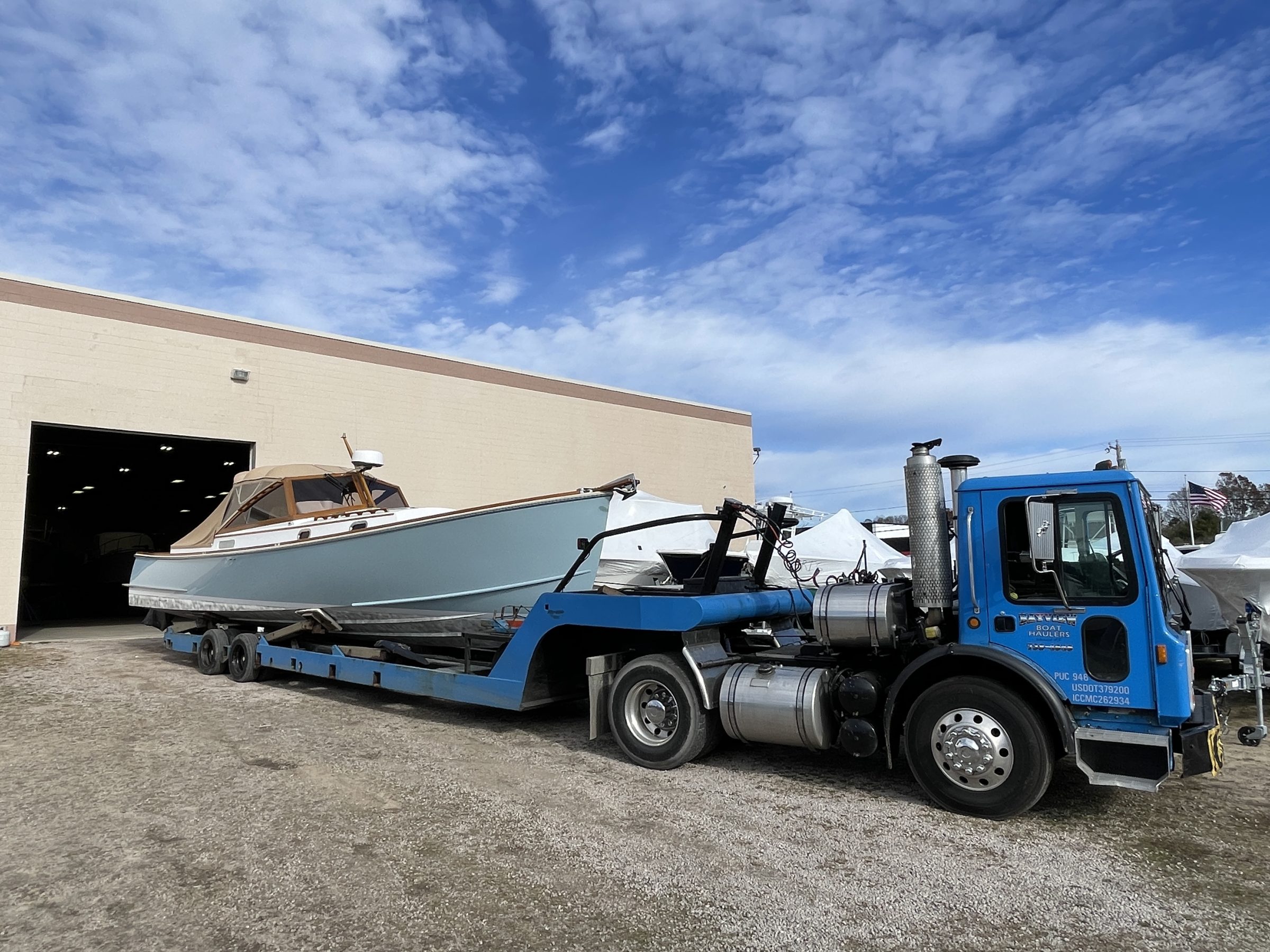 Inside the heated storage building, filled with boats for the winter