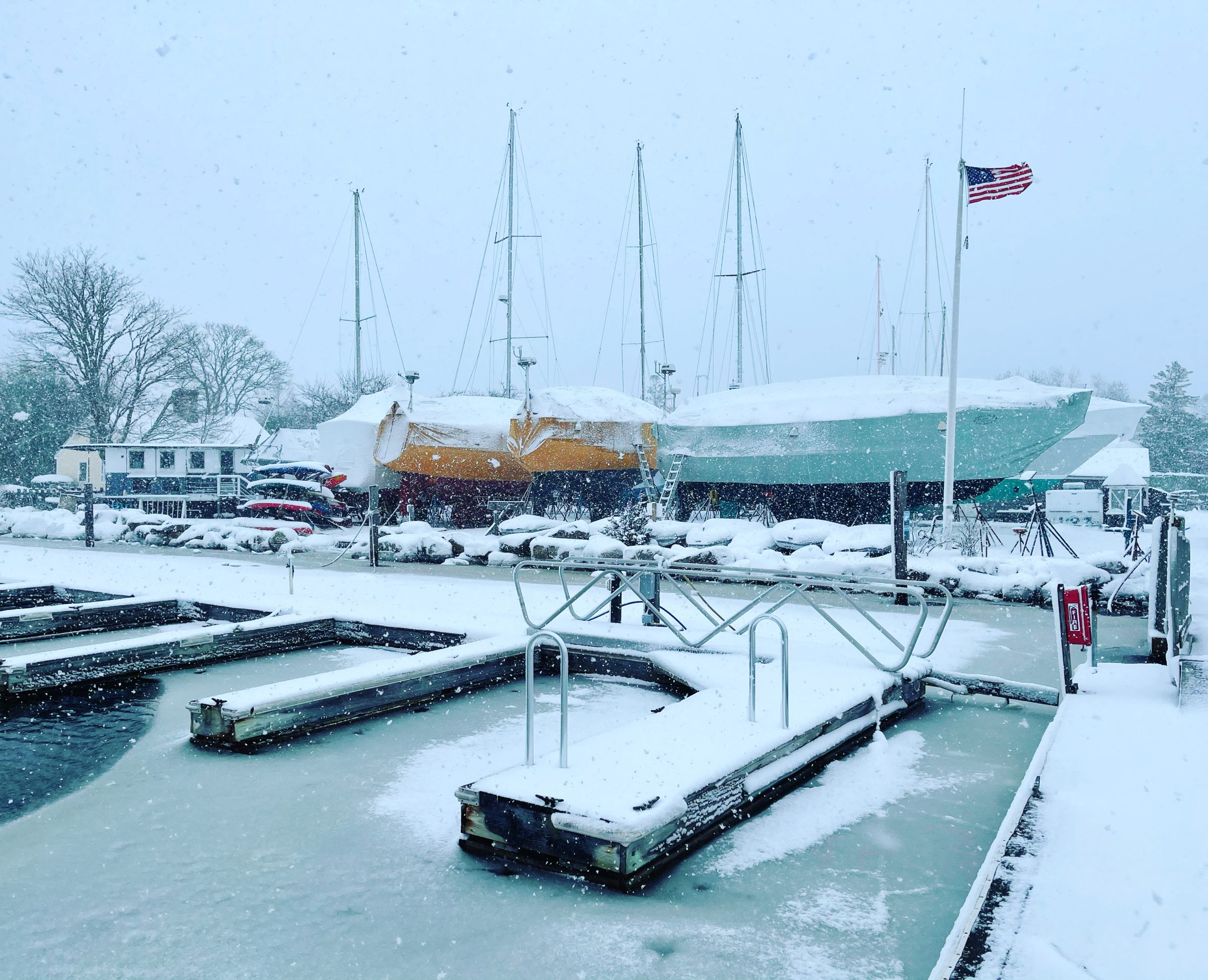 Rows of boats winterized inside Frank Hall Boat Yard's heated storage building